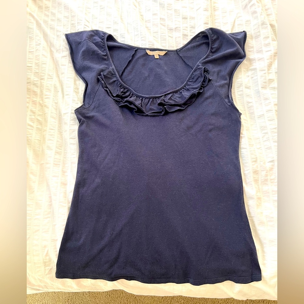 Women’s tee with ruffles.